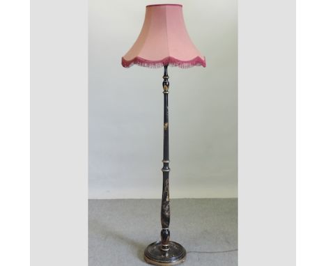 An early 20th century black chinoiserie decorated standard lamp and shade