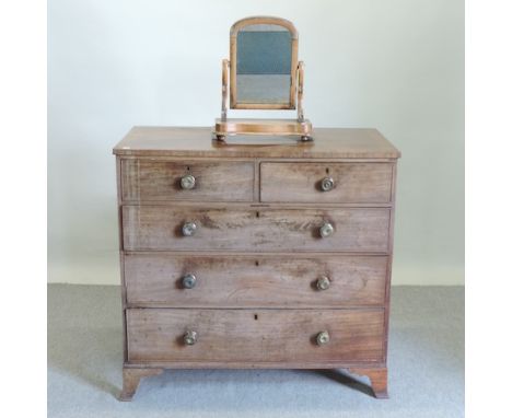 A George III mahogany chest of drawers on swept bracket feet, 108cm together with a toiletry mirror 