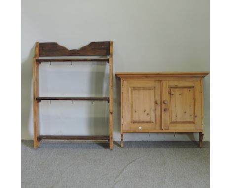 A pine hanging cabinet, together with a wall shelf, 77cm