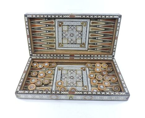 An anglo-indian sadelli work backgammon board, 50cm, with counters