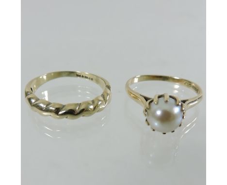 A 9 carat gold pearl single stone ring, together with a gold wedding band 
