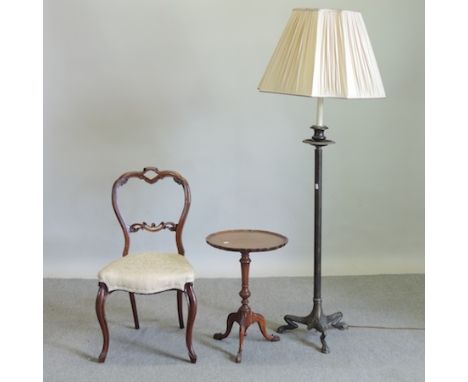 A bronzed George III style standard lamp together with a Victorian mahogany balloon back chair and a wine table 
