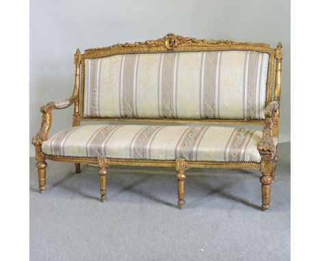 A French style gilt painted carved and silk upholstered sofa, 166cm