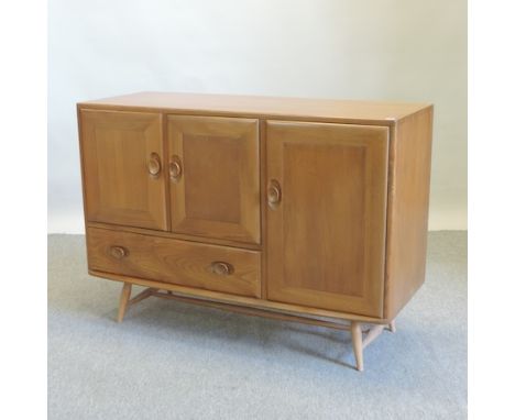 A 1970's Ercol light elm sideboard, 114cm
