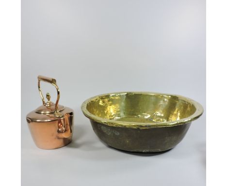 A large brass bowl, 43cm diameter, together with a copper kettle