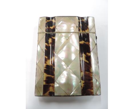 An early 20th century mother of pearl and tortoiseshell card case, 10.5cm
