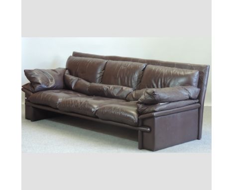 A 1970's brown leather upholstered three seater sofa, 222cm 