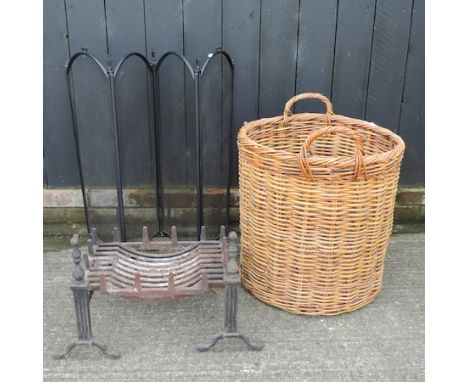 A cast iron fire basket, together with a pair of fire dogs, 48cm tall, a steel folding fire screen and a log bucket 