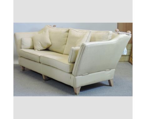 A gold upholstered three seater sofa, by Multiyork, 250cm