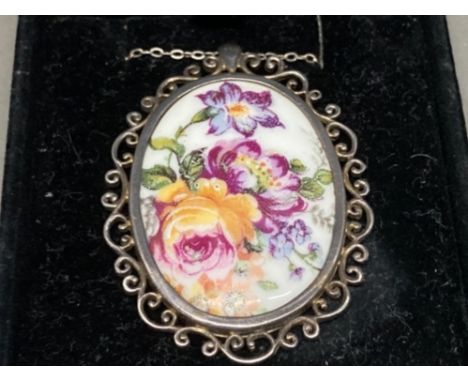 A silver and Limoges ceramic pendant on silver chain