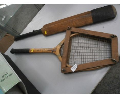 vintage tennis racquiet and cricket bat