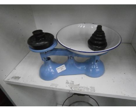 set of scales with weights and enamel pan