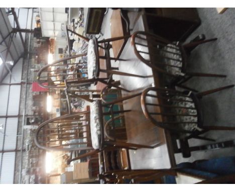 extending dining table and 6 ercol chairs