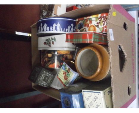 box of vintage tins and a stoneware pot