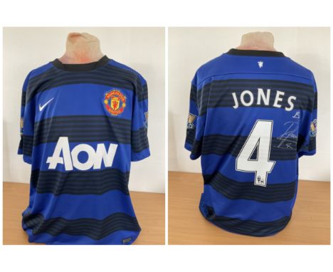 Football Phil Jones signed Manchester United replica Nike away shirt size x large. Good condition. All autographs are genuine