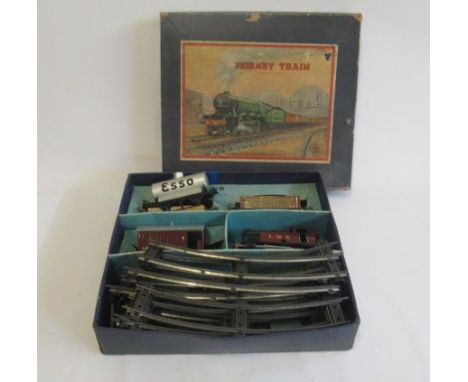 Hornby Post War clockwork train set with 101 LMS tank engine and goods wagons, F-G (Est. plus 21% premium inc. VAT)