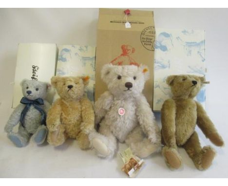 Four boxed Steiff bears, comprising a 42cm classic bear, a 33cm blond bear, a 41cm orange light brown bear and a 31cm 2009 gr