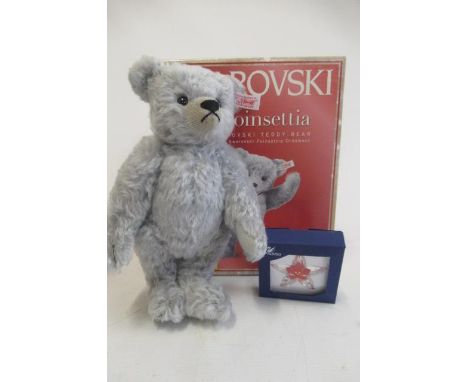 A boxed Steiff Poinsettia, "the Swarovski teddy bear", 26cm in grey plush and with floral glass pendant (Est. plus 21% premiu