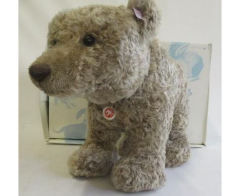 A boxed Steiff Grizzly bear, standing on four legs, 56cm long (Est. plus 21% premium inc. VAT)Good