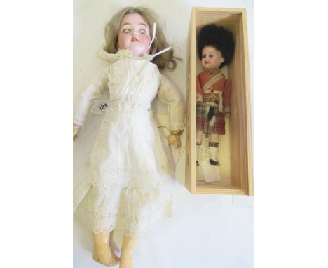 Two bisque socket head dolls, comprising one Heinrich Handwerck Simon & Halbig with brown glass sleeping eyes, open mouth, te