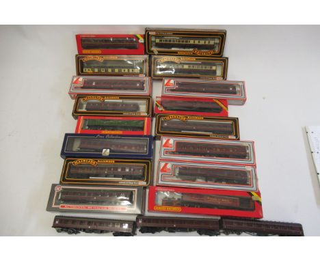 Sixteen B.R. red passenger coaches by Mainline, Lima and Hornby, all items boxed F-G, all three unboxed B.R. red coaches, F-G