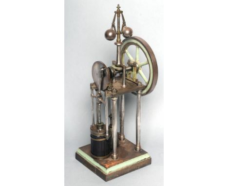 A vertical single cylinder stationary steam engine, 9" fly wheek with dummy regulator, 8" x 8" x 25", some minor rust patches