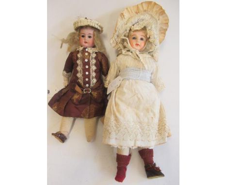 Two German bisque shoulder head dolls, one Armand Marseille 10/0X, with brown glass fixed eyes, open mouth, teeth, blond wig,