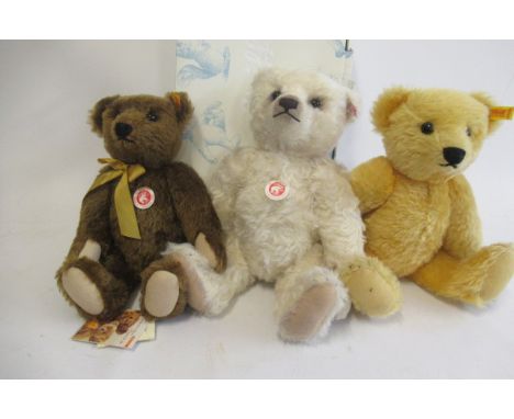 Three Steiff bears, comprising a 38cm Leopold bear with box, a 33cm 1909 brown bear, and a 37cm growling blond bear (Est. plu