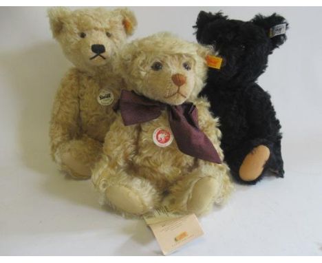 Three Steiff bears, comprising a 35cm 1920 bear, a 34cm 1953 black bear, and a 30cm classic bear (Est. plus 21% premium inc. 