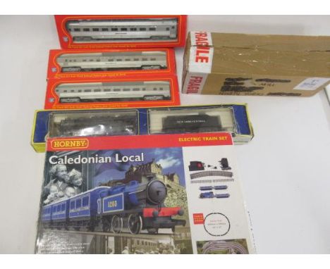 HO Scale A.H.M. Hudson locomotive and three Santa-Fe coaches, and a Hornby Caledonian 0-4-0 train set with Hornby T.P.O., mos