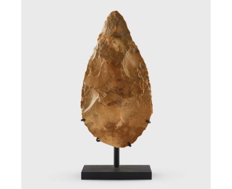  AFRICAN PALAEOLITHIC STONE HANDAXE WESTERN SAHARA, LATE ACHEULEAN, 250,000 - 200,000 B.C. knapped jasper, of teardrop form, 