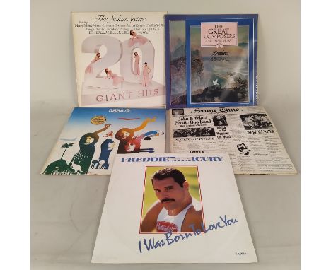A selection of vintage vinyl 45's and LP's, 70's to 80's including David Bowie, The Who etc