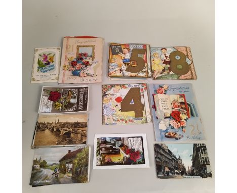 A large selection of vintage circa 1940's to 60's childrens birthday cards, a selection of postcards, cigar labels and old ne