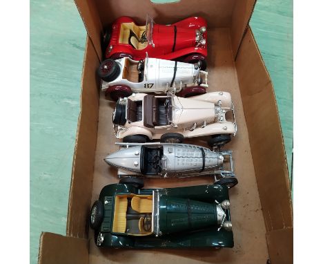 Nine Burago and Maisto 1:18 scale die cast cars plus a selection of display boxes