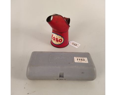 A vintage Alfa Romeo 'Alfasud' tool kit plus a vintage Esso half pint oil can