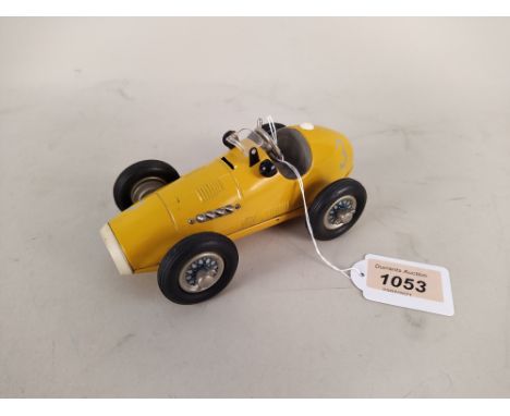A vintage Schuco tin plate Grand Prix racer 1070 (mild playworn)