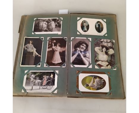 A vintage postcard album with many Edwardian era actresses, black and white plus coloured photographs