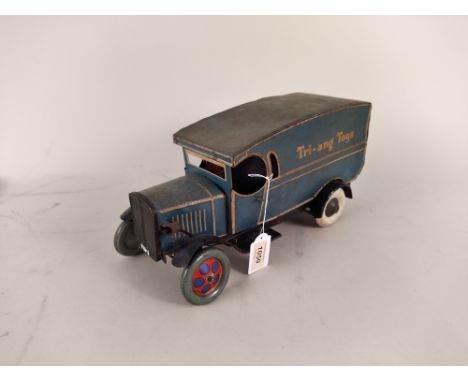 A vintage Triang Toys tin plate van, 12 1/2" long (replacement front wheels and playworn condition)