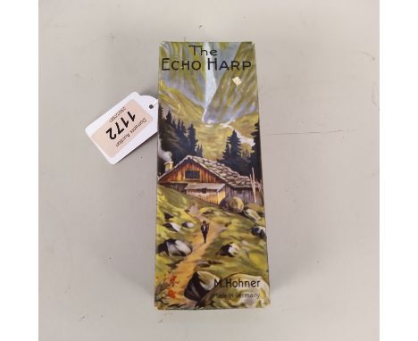 A vintage boxed Hohner 'Echo Harp' mouth organ