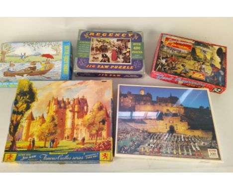 A selection of vintage boxed jigsaw puzzles