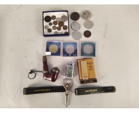 Various vintage table lighters, a small coin collection, corkscrews and bottle openers