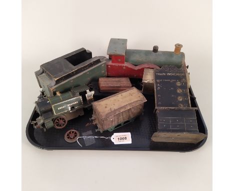 A wooden train with tender, a clockwork tin plate engine (as found), two carriages plus a vintage tin plate train indicator p
