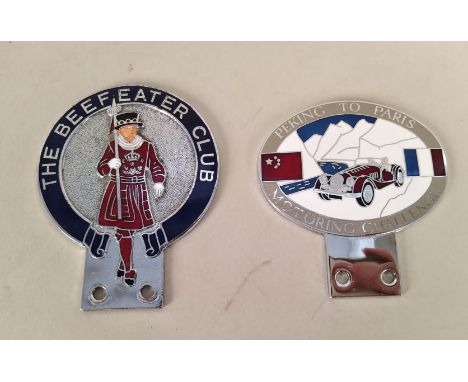 Five vintage car club badges including AA Malaya, RAC, 'The Beefeater Club', 'The Royal Automobile Club' and Peking to Paris 