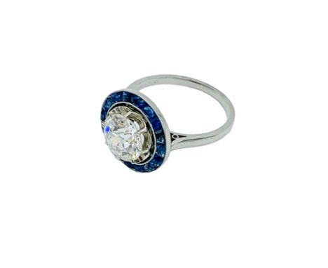 18ct white gold diamond and sapphire target ring, size N, weight 5.8gm, size of centre diamond approximately 3.5ct. Estimate 