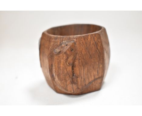 An early 20th century Robert ' Mouseman ' Thompson napkin ring carved in oak with typical mouse signature.