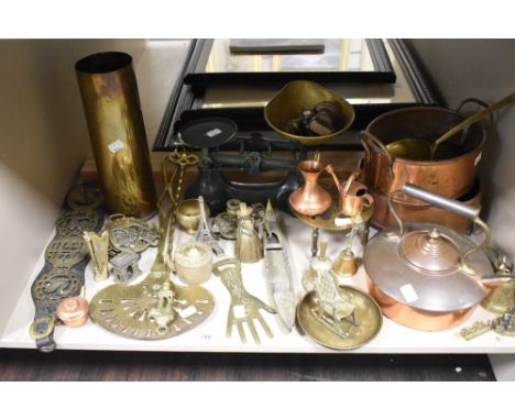 A selection of metal hardware items including balance scales with weight set, copper cooking pots, stove kettle and horse bra