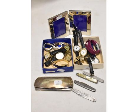 A selection of ladies wrist watches including Citizen, Rotary and Clio. Also including four small pocket knives.