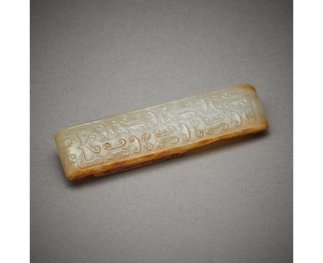 17th century Chinese carved russet jade belt slide with a delicate curling design. A very fine level of carving, excellent su