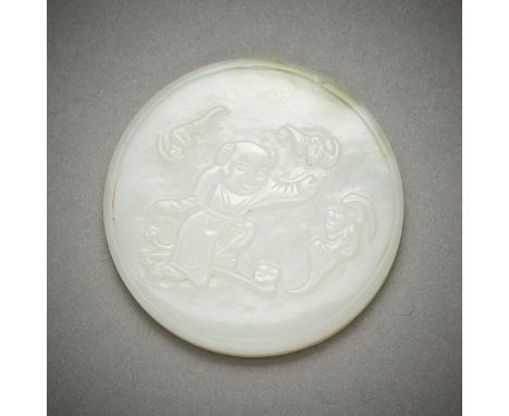 Chinese carved jade plaque or disc. One side depicting a deer next to a rock formation with a bat swooping above a tree. The 