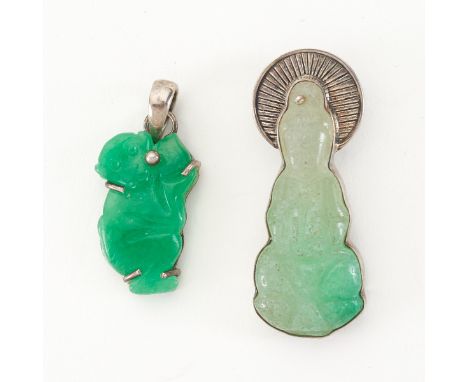 Group of two Chinese stone carvings, mounted in sterling. One carved jade monkey, of B+C dyed and impregnated jade, and one q